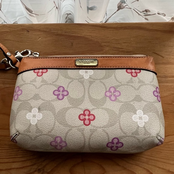 Coach Handbags - Coach Monogram Floral Print Wristlet-Like New